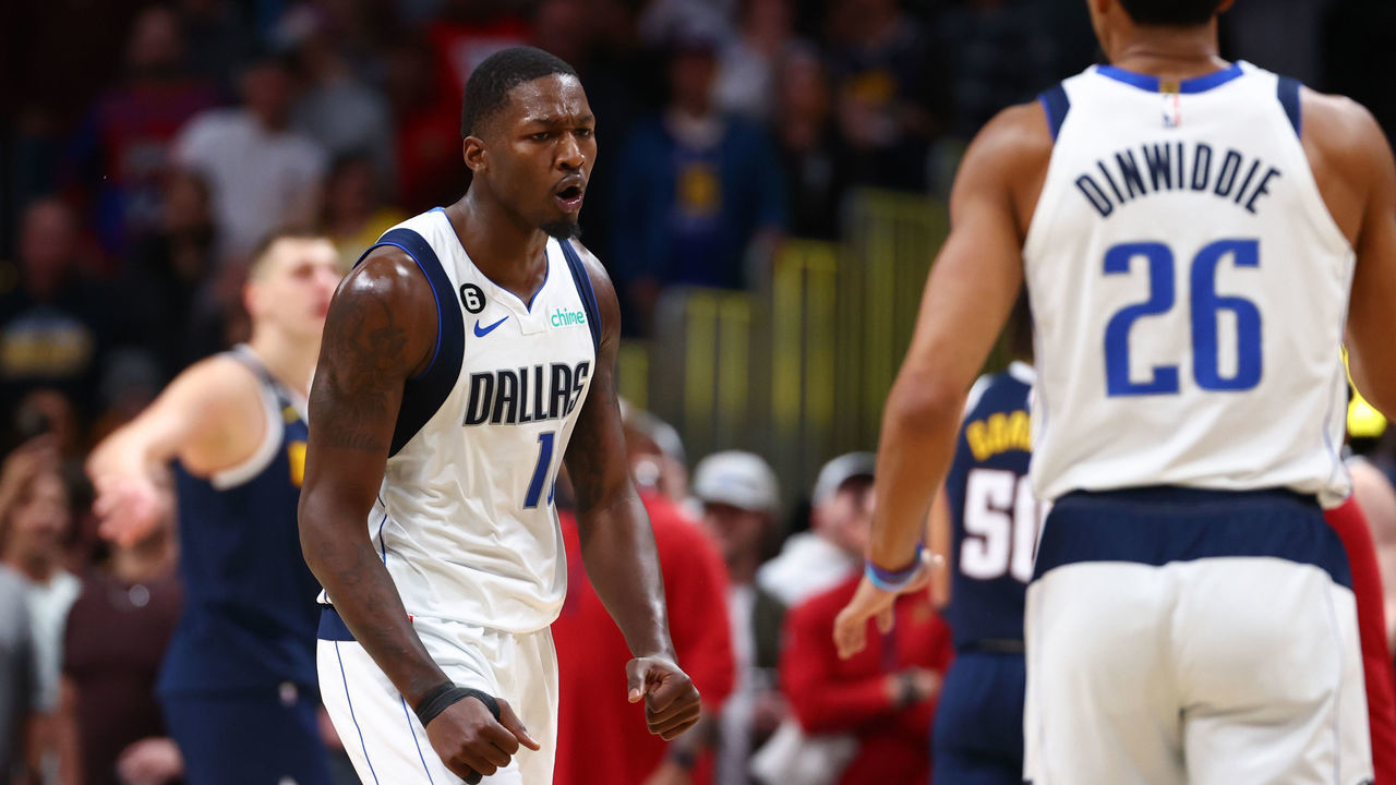 DENVER, CO - DECEMBER 06: Dorian Finney-Smith #10 of the Dallas Mavericks reacts after a score against the Denver Nuggets in the second half at Ball Arena on December 6, 2022 in Denver, Colorado.