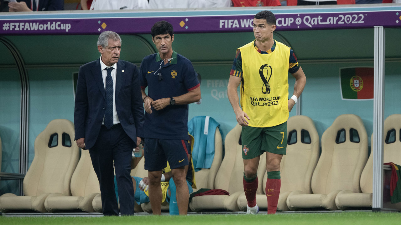 LUSAIL CITY, QATAR - DECEMBER 06: Portugal head coach Fernando Santos and substitute Cristiano Ronaldo during the FIFA World Cup Qatar 2022 Round of 16 match between Portugal and Switzerland at Lusail Stadium on December 6, 2022 in Lusail City, Qatar.