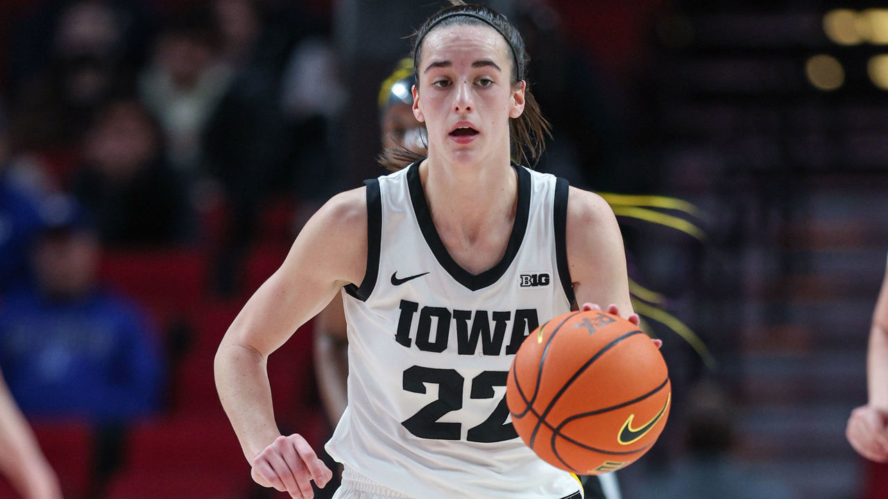 PORTLAND, OR - NOVEMBER 27: Caitlin Clark #22 of the Iowa Hawkeyes brings the ball up court during the game against the UConn Huskies at Moda Center on November 27, 2022 in Portland, Oregon.
