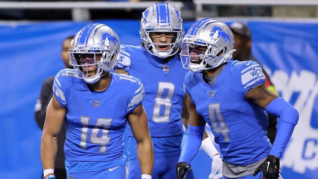 DETROIT, MICHIGAN - DECEMBER 04: Amon-Ra St. Brown #14 of the Detroit Lions celebrates after a touchdown in the first quarter of the game against the Jacksonville Jaguars at Ford Field on December 04, 2022 in Detroit, Michigan.