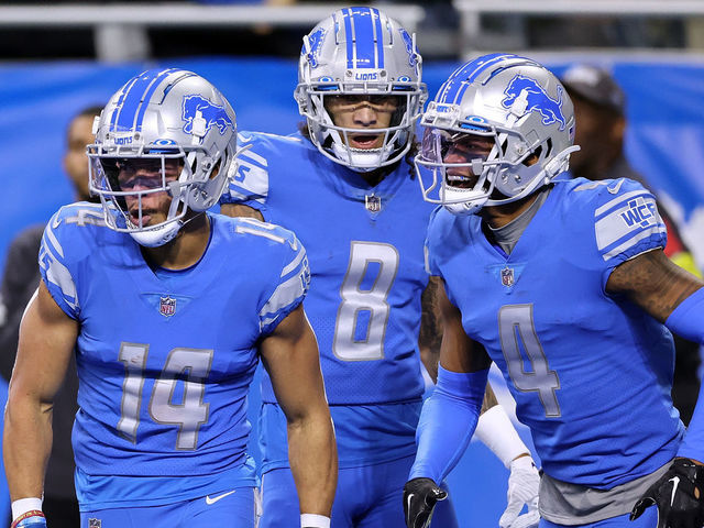 DETROIT, MICHIGAN - DECEMBER 04: Amon-Ra St. Brown #14 of the Detroit Lions celebrates after a touchdown in the first quarter of the game against the Jacksonville Jaguars at Ford Field on December 04, 2022 in Detroit, Michigan.