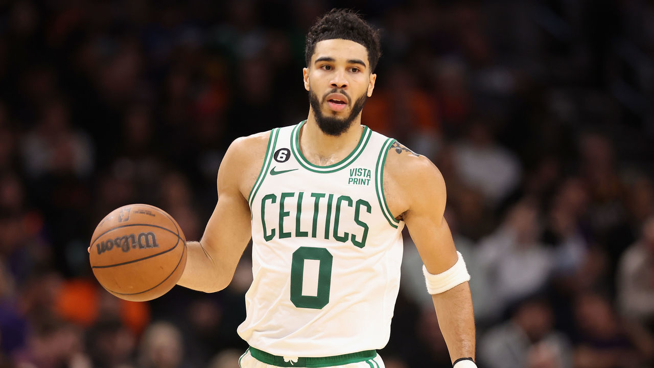 PHOENIX, ARIZONA - DECEMBER 07: Jayson Tatum #0 of the Boston Celtics handles the ball during the first half of the NBA game against the Phoenix Suns at Footprint Center on December 07, 2022 in Phoenix, Arizona.