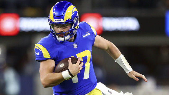 INGLEWOOD, CA - DECEMBER 8: Baker Mayfield #17 of the Los Angeles Rams carries the ball during the first quarter of an NFL football game against the Las Vegas Raiders at SoFi Stadium on December 8, 2022 in Inglewood, California.
