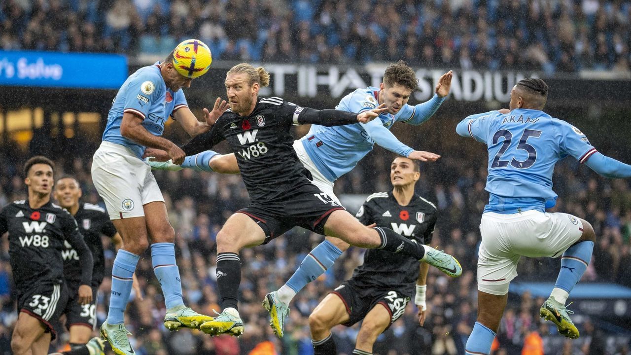 MANCHESTER, ENGLAND - NOVEMBER 05: Rodrigo of Man City heads the ball during the Premier League match between Manchester City and Fulham at the Etihad Stadium on November 5, 2022 in Manchester, United Kingdom.