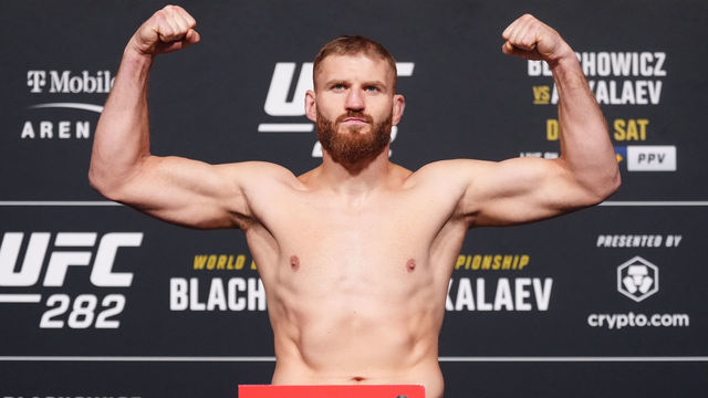 LAS VEGAS, NEVADA - DECEMBER 09: Jan Blachowicz of Poland poses on the scale during the UFC 282 official weigh-in at UFC APEX a on December 09, 2022 in Las Vegas, Nevada.