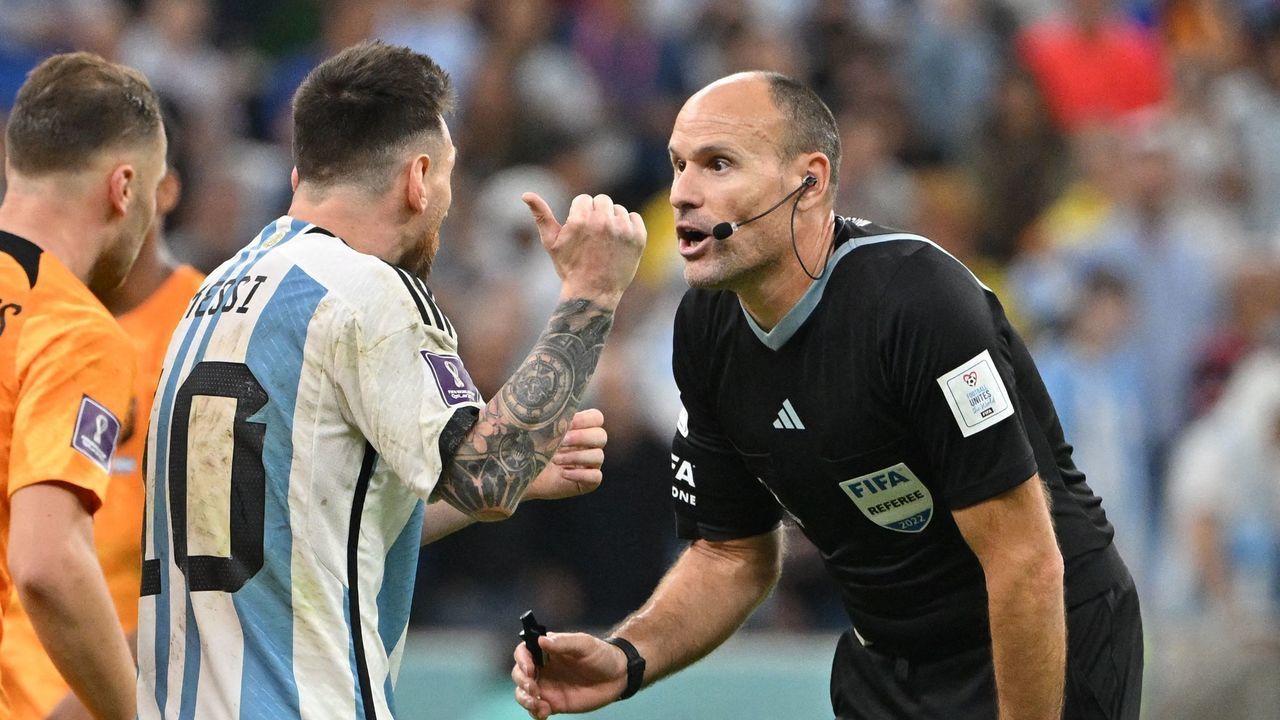 Argentina's forward #10 Lionel Messi argues with Spanish referee Antonio Mateu Lahoz during the Qatar 2022 World Cup quarter-final football match between Netherlands and Argentina at Lusail Stadium, north of Doha, on December 9, 2022.