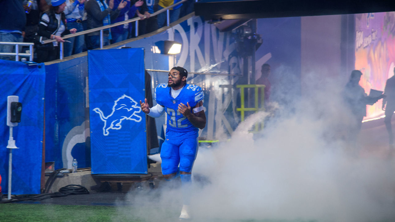 DETROIT, MI - DECEMBER 04: Detroit Lions running back D'Andre Swift (32) runs in during pregame introductions for the Detroit Lions versus the Jacksonville Jaguars game on Sunday December 4, 2022 at Ford Field in Detroit, MI.