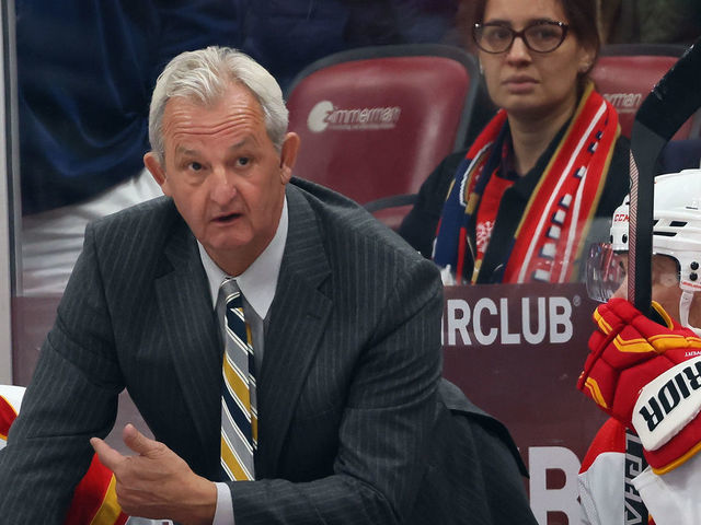 SUNRISE, FLORIDA - NOVEMBER 19: Head coach Darryl Sutter of the Calgary Flames handles the bench during the third period against the Florida Panthers at FLA Live Arena on November 19, 2022 in Sunrise, Florida. The Flames defeated the Panthers 5-4 in the shootout.