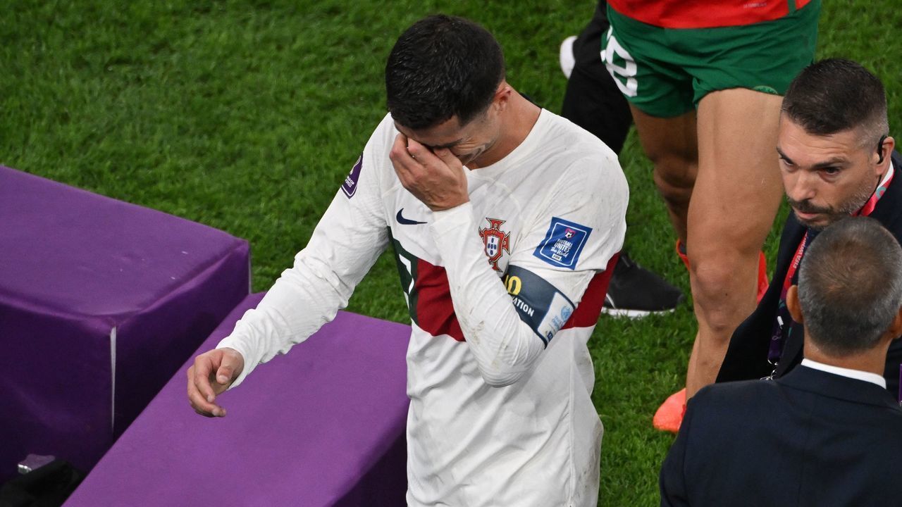 Portugal's forward #07 Cristiano Ronaldo leaves the field after losing to Morocco 1-0 in the Qatar 2022 World Cup quarter-final football match between Morocco and Portugal at the Al-Thumama Stadium in Doha on December 10, 2022.