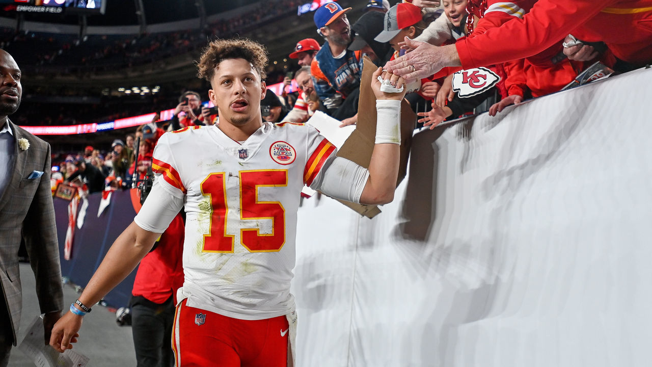 DENVER, CO - DECEMBER 11: Kansas City Chiefs quarterback Patrick Mahomes (15) celebrates a win over the Denver Broncos with fans after a game between the Kansas City Chiefs and the Denver Broncos at Empower Field at Mile High on December 11, 2022 in Denver, Colorado.