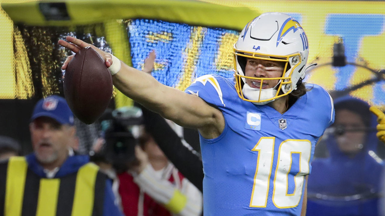 Los Angeles, CA - December 11: Los Angeles Chargers quarterback Justin Herbert reacts after getting a first diwb ib a quarterback scramble during the second half against the Miami Dolphins at SoFi Stadium on Sunday, Dec. 11, 2022 in Los Angeles, CA.(Allen J. Schaben / Los Angeles Times via Getty Images)