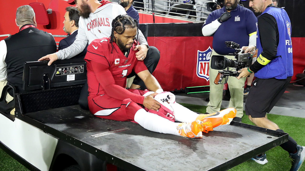 GLENDALE, ARIZONA - DECEMBER 12: Kyler Murray #1 of the Arizona Cardinals is carted off the field after being injured against the New England Patriots during the first quarter of the game at State Farm Stadium on December 12, 2022 in Glendale, Arizona.