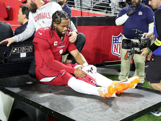 GLENDALE, ARIZONA - DECEMBER 12: Kyler Murray #1 of the Arizona Cardinals is carted off the field after being injured against the New England Patriots during the first quarter of the game at State Farm Stadium on December 12, 2022 in Glendale, Arizona.