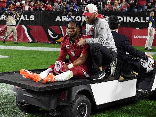 GLENDALE, ARIZONA - DECEMBER 12: Kyler Murray #1 of the Arizona Cardinals is carted off the field after being injured against the New England Patriots during the first quarter of the game at State Farm Stadium on December 12, 2022 in Glendale, Arizona.