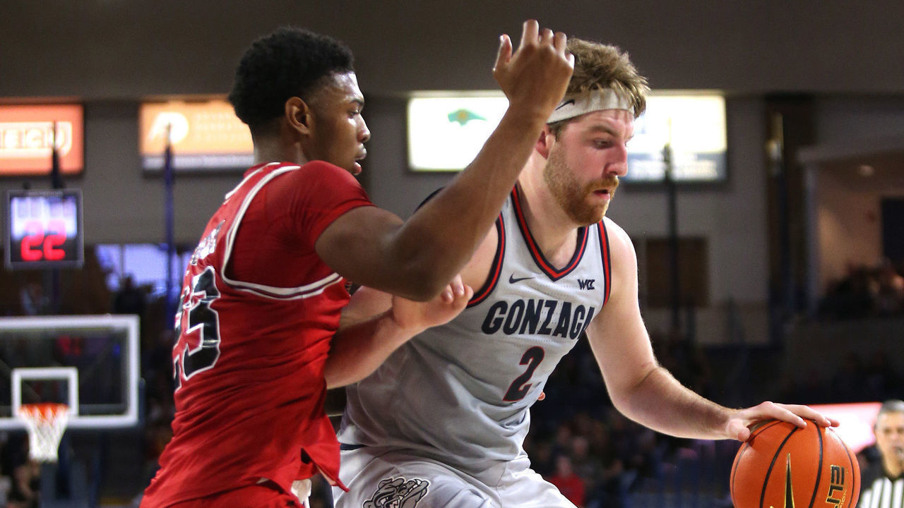 SPOKANE, WASHINGTON - DECEMBER 12: Drew Timme #2 of the Gonzaga Bulldogs controls the ball against Harvin Ibarguen #23 of the Northern Illinois Huskies in the second half at McCarthey Athletic Center on December 12, 2022 in Spokane, Washington. Gonzaga defeats Northern Illinois 88-67.