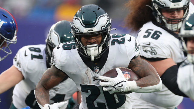 EAST RUTHERFORD, NEW JERSEY - DECEMBER 11: Miles Sanders #26 of the Philadelphia Eagles runs with the ball during the first half of the game against the New York Giants at MetLife Stadium on December 11, 2022 in East Rutherford, New Jersey.