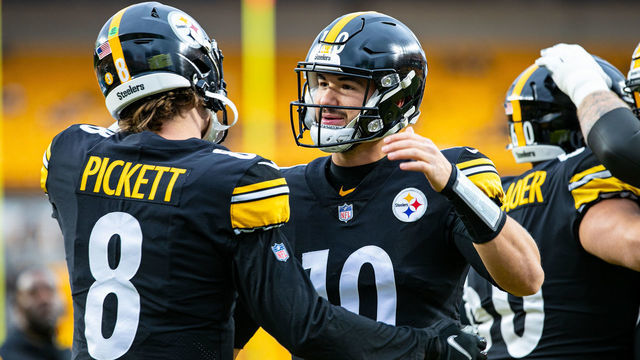 PITTSBURGH, PA - DECEMBER 11: Pittsburgh Steelers quarterback Kenny Pickett (8) and Pittsburgh Steelers quarterback Mitch Trubisky (10) hug during the national football league game between the Baltimore Ravens and the Pittsburgh Steelers on December 11, 2022 at Acrisure Stadium in Pittsburgh, PA.