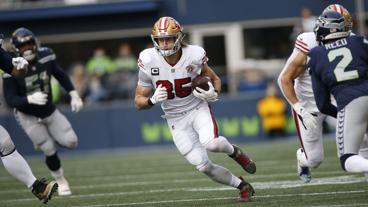 SEATTLE, WA - DECEMBER 5: George Kittle #85 of the San Francisco 49ers runs after making a catch during the game against the Seattle Seahawks at Lumen Field on December 5, 2021 in Seattle, Washington. The Seahawks defeated the 49ers 30-23.