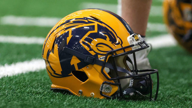 KENT, OH - APRIL 16: A Kent State Golden Flashes helmet on the sideline during the Kent State Golden Flashes spring football game on April 16, 2022, at Dix Stadium in Kent, OH.