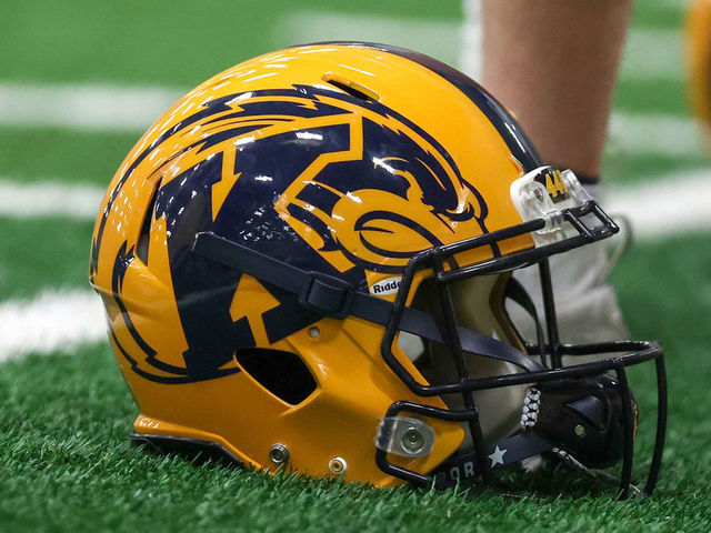 KENT, OH - APRIL 16: A Kent State Golden Flashes helmet on the sideline during the Kent State Golden Flashes spring football game on April 16, 2022, at Dix Stadium in Kent, OH.
