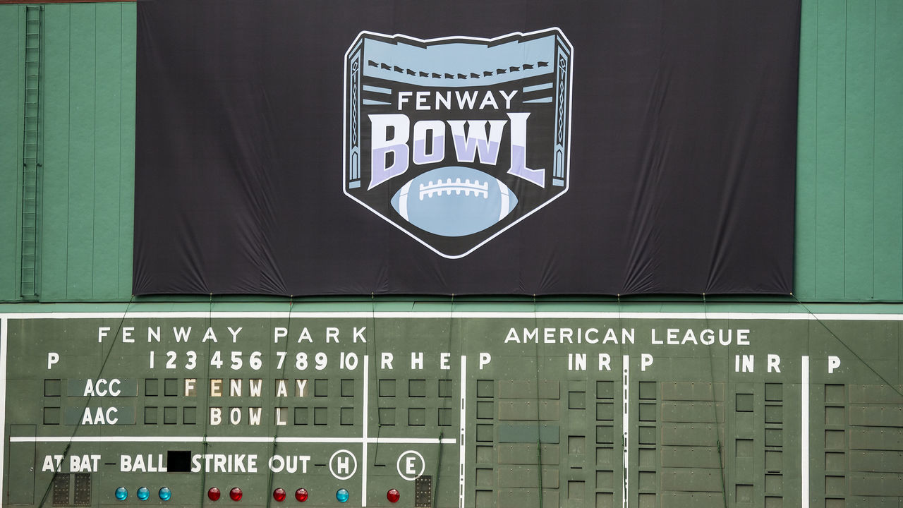 BOSTON, MA - SEPTEMBER 17: The log is unveiled on the Green Monster during a press conference announcing The Fenway Bowl college football bowl game series beginning in 2020 on September 17, 2019 at Fenway Park in Boston, Massachusetts.