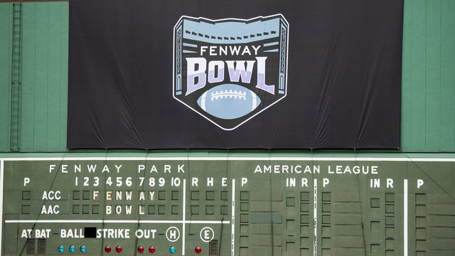 BOSTON, MA - SEPTEMBER 17: The log is unveiled on the Green Monster during a press conference announcing The Fenway Bowl college football bowl game series beginning in 2020 on September 17, 2019 at Fenway Park in Boston, Massachusetts.
