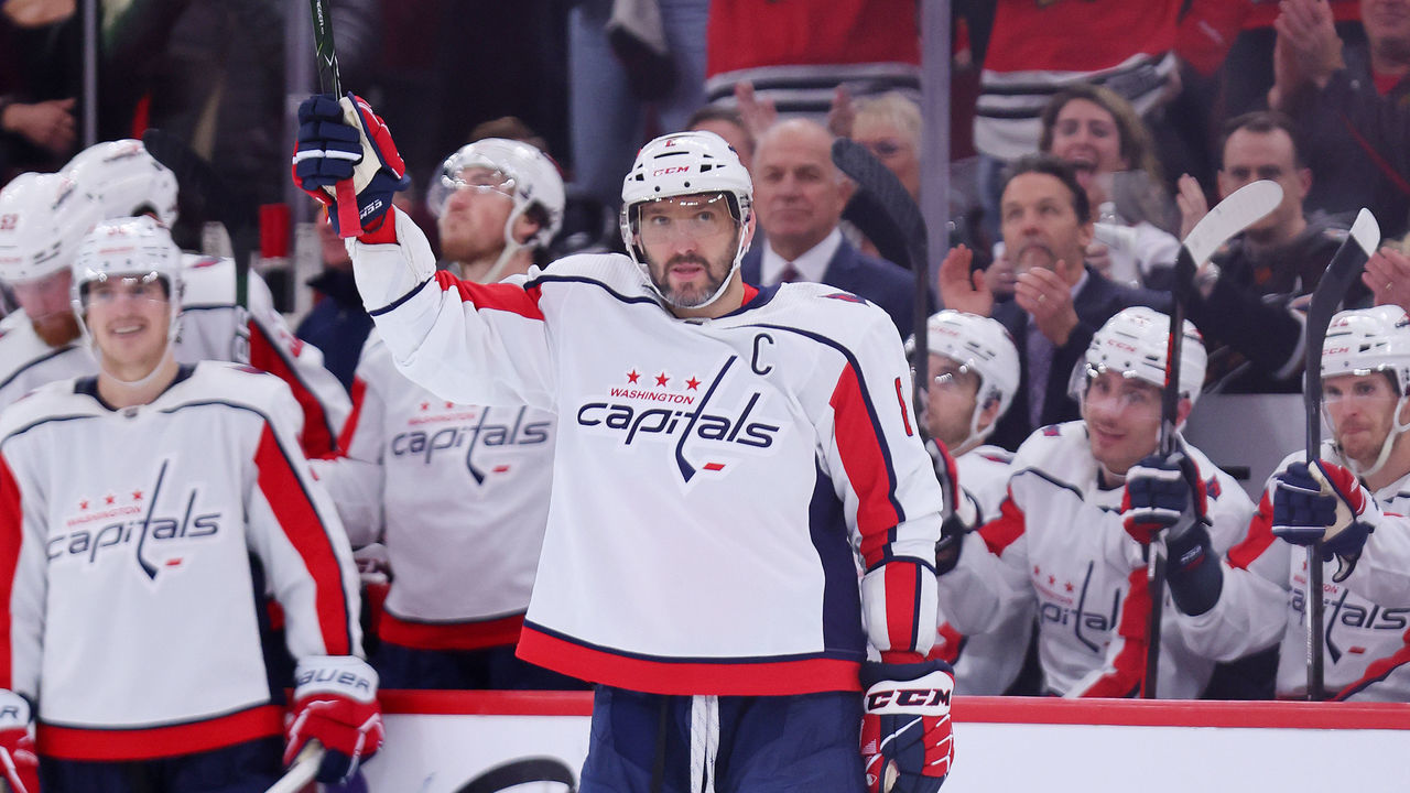 CHICAGO, ILLINOIS - DECEMBER 13: Alex Ovechkin #8 of the Washington Capitals waves to the crowd as he is honored after scoring his 800th career goal against the Chicago Blackhawks during the third period at United Center on December 13, 2022 in Chicago, Illinois.