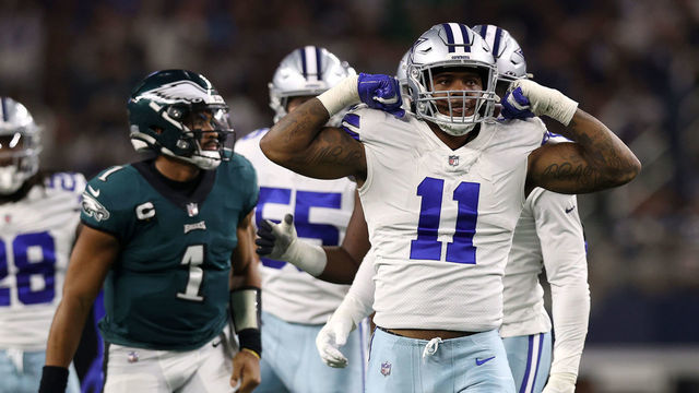 ARLINGTON, TEXAS - SEPTEMBER 27: Micah Parsons #11 of the Dallas Cowboys celebrates a sack of Jalen Hurts #1 of the Philadelphia Eagles at AT&T Stadium on September 27, 2021 in Arlington, Texas.