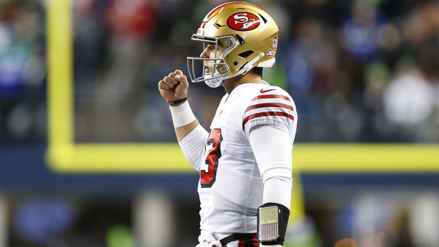 SEATTLE, WASHINGTON - DECEMBER 15: Brock Purdy #13 of the San Francisco 49ers celebrates after a touchdown against the Seattle Seahawks during the third quarter of the game at Lumen Field on December 15, 2022 in Seattle, Washington.