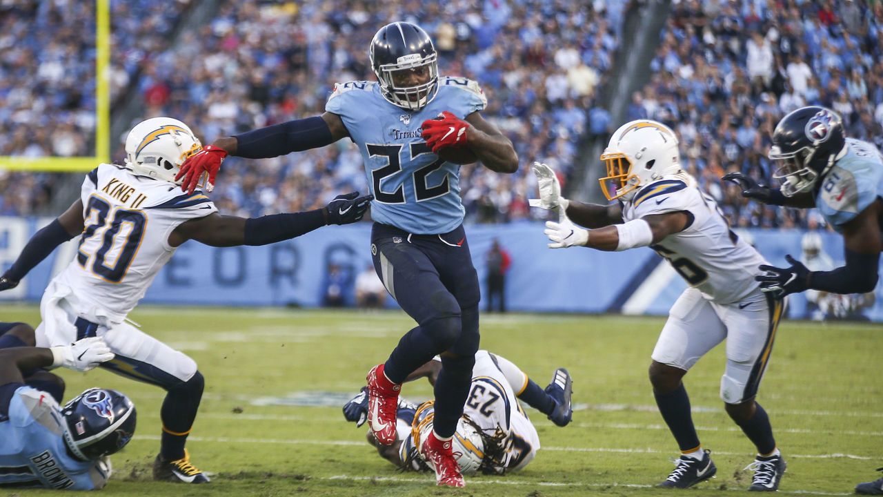 NASHVILLE, TENNESSEE - OCTOBER 20: Derrick Henry #22 of the Tennessee Titans runs with the ball against the Los Angeles Charger during the third quarter of the game at Nissan Stadium on October 20, 2019 in Nashville, Tennessee.