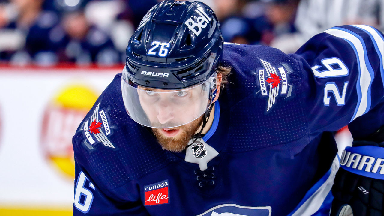 WINNIPEG, CANADA - DECEMBER 4: Blake Wheeler #26 of the Winnipeg Jets gets set during a second period face-off against the Anaheim Ducks at the Canada Life Centre on December 4, 2022 in Winnipeg, Manitoba, Canada. The Jets defeated the Ducks 5-2.