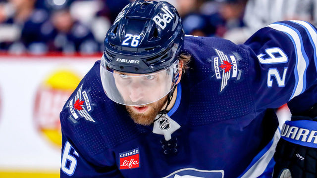 WINNIPEG, CANADA - DECEMBER 4: Blake Wheeler #26 of the Winnipeg Jets gets set during a second period face-off against the Anaheim Ducks at the Canada Life Centre on December 4, 2022 in Winnipeg, Manitoba, Canada. The Jets defeated the Ducks 5-2.