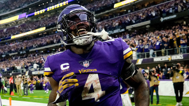 MINNEAPOLIS, MINNESOTA - DECEMBER 17: Dalvin Cook #4 of the Minnesota Vikings celebrates after rushing for a touchdown against the Indianapolis Colts during the fourth quarter of the game at U.S. Bank Stadium on December 17, 2022 in Minneapolis, Minnesota.