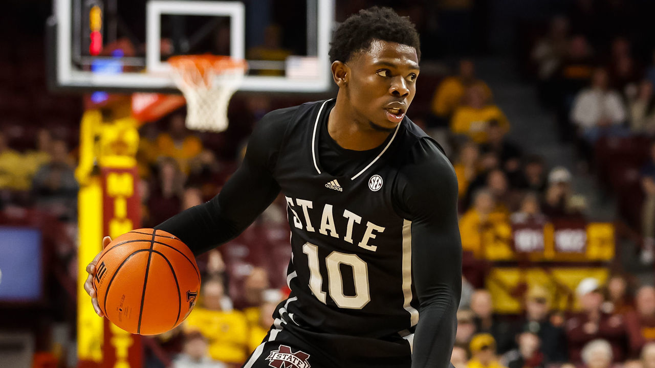 MINNEAPOLIS, MN - DECEMBER 11: Dashawn Davis #10 of the Mississippi State Bulldogs dribbles the ball while Ta'lon Cooper #55 of the Minnesota Golden Gophers defends in the second half of the game at Williams Arena on December 11, 2022 in Minneapolis, Minnesota. The Bulldogs defeated the Golden Gophers 69-51.