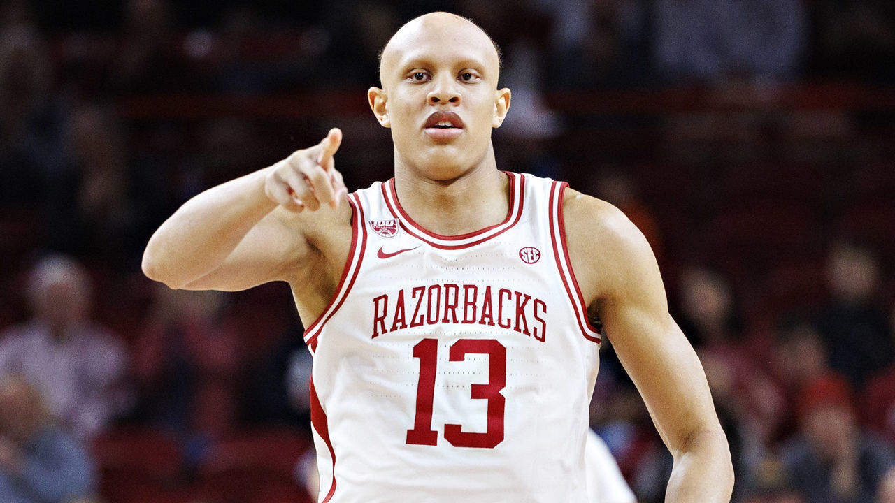 FAYETTEVILLE, ARKANSAS - NOVEMBER 16: Jordan Walsh #13 of the Arkansas Razorbacks points down the court during a game against the South Dakota State Jackrabbits at Bud Walton Arena on November 16, 2022 in Fayetteville, Arkansas. The Razorbacks defeated the Jackrabbits 71-56.