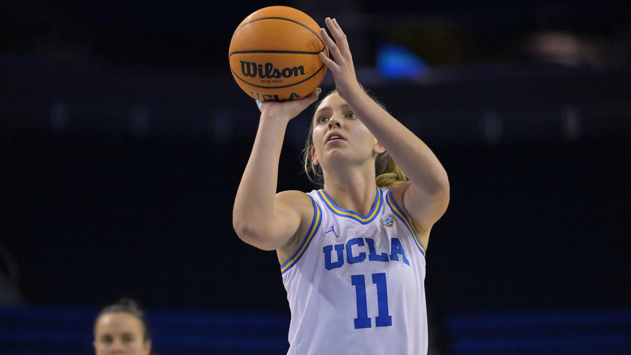 LOS ANGELES, CA - DECEMBER 10: Emily Bessoir #11 of the UCLA Bruins shoots a free throw against the CSU Fullerton Titans at UCLA Pauley Pavilion on December 10, 2022 in Los Angeles, California.