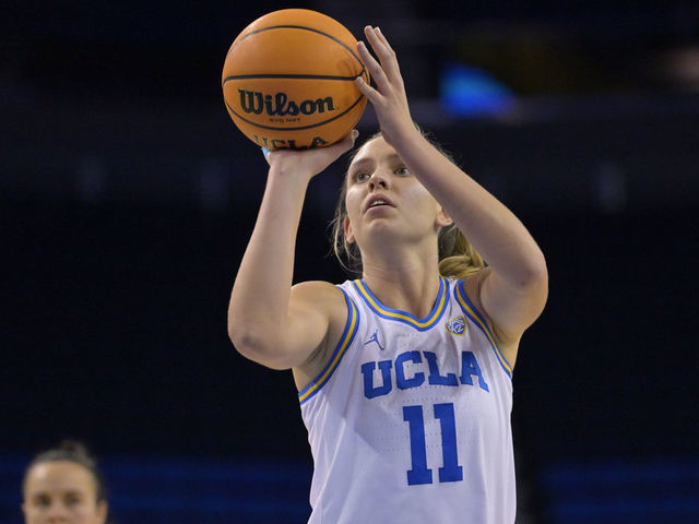 LOS ANGELES, CA - DECEMBER 10: Emily Bessoir #11 of the UCLA Bruins shoots a free throw against the CSU Fullerton Titans at UCLA Pauley Pavilion on December 10, 2022 in Los Angeles, California.