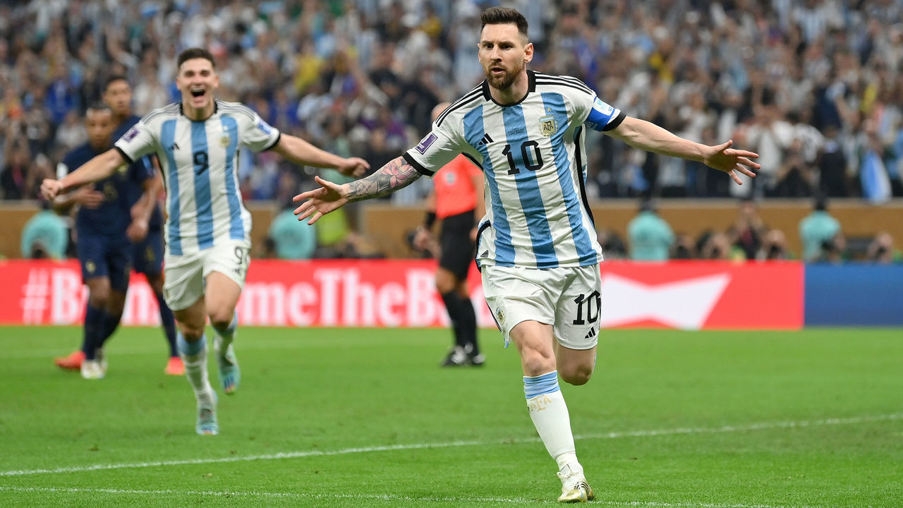 LUSAIL CITY, QATAR - DECEMBER 18: Lionel Messi of Argentina celebrates after scoring the team's first goal via a penalty during the FIFA World Cup Qatar 2022 Final match between Argentina and France at Lusail Stadium on December 18, 2022 in Lusail City, Qatar.