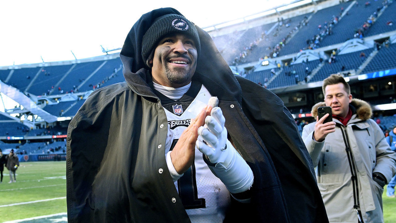 CHICAGO, ILLINOIS - DECEMBER 18: Jalen Hurts #1 of the Philadelphia Eagles on the field after the win over the Chicago Bears at Soldier Field on December 18, 2022 in Chicago, Illinois.