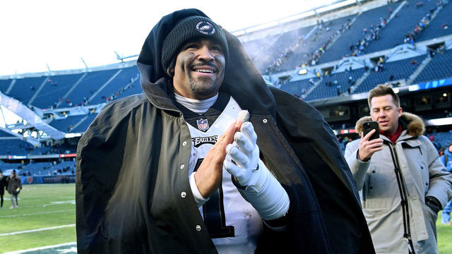 CHICAGO, ILLINOIS - DECEMBER 18: Jalen Hurts #1 of the Philadelphia Eagles on the field after the win over the Chicago Bears at Soldier Field on December 18, 2022 in Chicago, Illinois.