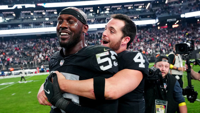 LAS VEGAS, NEVADA - DECEMBER 18: Chandler Jones #55 and Derek Carr #4 of the Las Vegas Raiders celebrate after defeating the New England Patriots at Allegiant Stadium on December 18, 2022 in Las Vegas, Nevada.