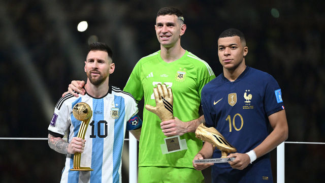 LUSAIL CITY, QATAR - DECEMBER 18: (L-R) Lionel Messi best player, Goalkeeper Emiliano Martinez of Argentina best goalkeeper during the FIFA World Cup Qatar 2022 Final match between Argentina and France at Lusail Stadium on December 18, 2022 in Lusail City, Qatar.