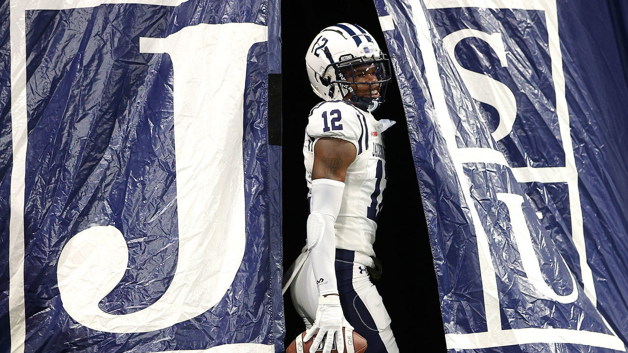 ATLANTA, GEORGIA - DECEMBER 17: Travis Hunter #12 of the Jackson State Tigers walks out of the tunnel during pregame warmups prior to the Cricket Celebration Bowl against the North Carolina Central Eagles at Mercedes-Benz Stadium on December 17, 2022 in Atlanta, Georgia.