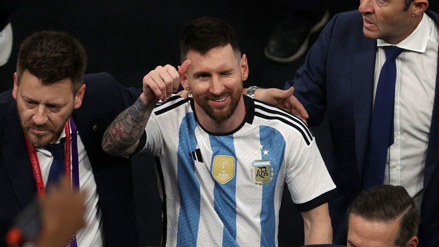LUSAIL CITY, QATAR - DECEMBER 18: Lionel Messi of Argentina winks to the crowd as he leaves the pitch for the last time after the FIFA World Cup Qatar 2022 Final match between Argentina and France at Lusail Stadium on December 18, 2022 in Lusail City, Qatar.