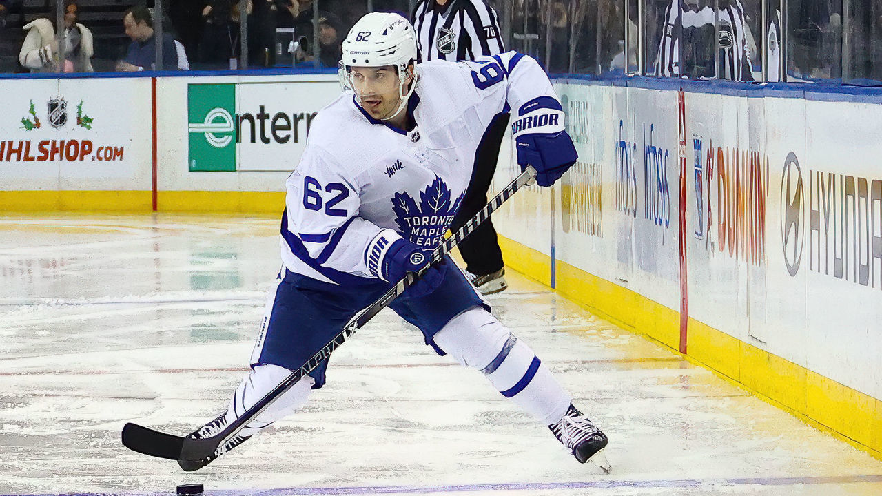 NEW YORK, NY - DECEMBER 15: Toronto Maple Leafs Winger Denis Malgin (62) skates with the puck during the second period of the National Hockey League game between the Toronto Maple Leafs and the New York Rangers on December 15, 2022 at Madison Square Garden in New York, NY.