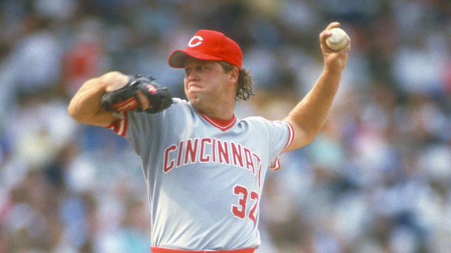 CHICAGO, IL - CIRCA 1987: Tom Browning #32 of the Cincinnati Reds pitches against the Chicago Cubs during an Major League Baseball game circa 1987 at Wrigley Field in Chicago, Illinois. Browning played for the Reds from 1984-94.