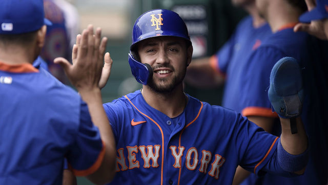WASHINGTON, DC - SEPTEMBER 05: Michael Conforto #30 of the New York Mets celebrates with teammates after scoring against the Washington Nationals at Nationals Park on September 05, 2021 in Washington, DC.