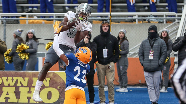 BOISE, ID - DECEMBER 20: Wide receiver Darius Lassiter #9 of the Eastern Michigan Eagles catches a touchdown pass over the defense of corner back Nehemiah Shelton #23 of the San Jose State Spartans during the first half of the Famous Idaho Potato Bowl at Albertsons Stadium on December 20, 2022 in Boise, Idaho.