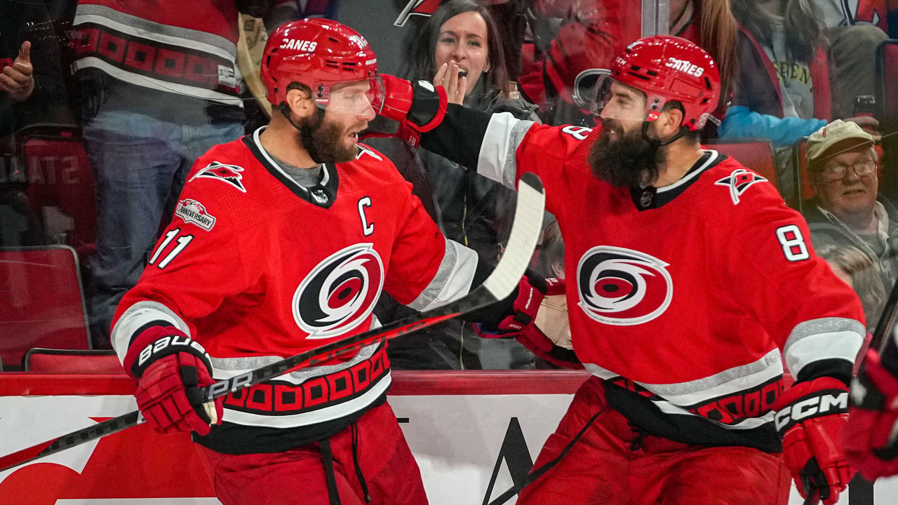 RALEIGH, NORTH CAROLINA - DECEMBER 20: Jordan Staal #11 of the Carolina Hurricanes celebrates after scoring a goal during the second period against the New Jersey Devils at PNC Arena on December 20, 2022 in Raleigh, North Carolina.