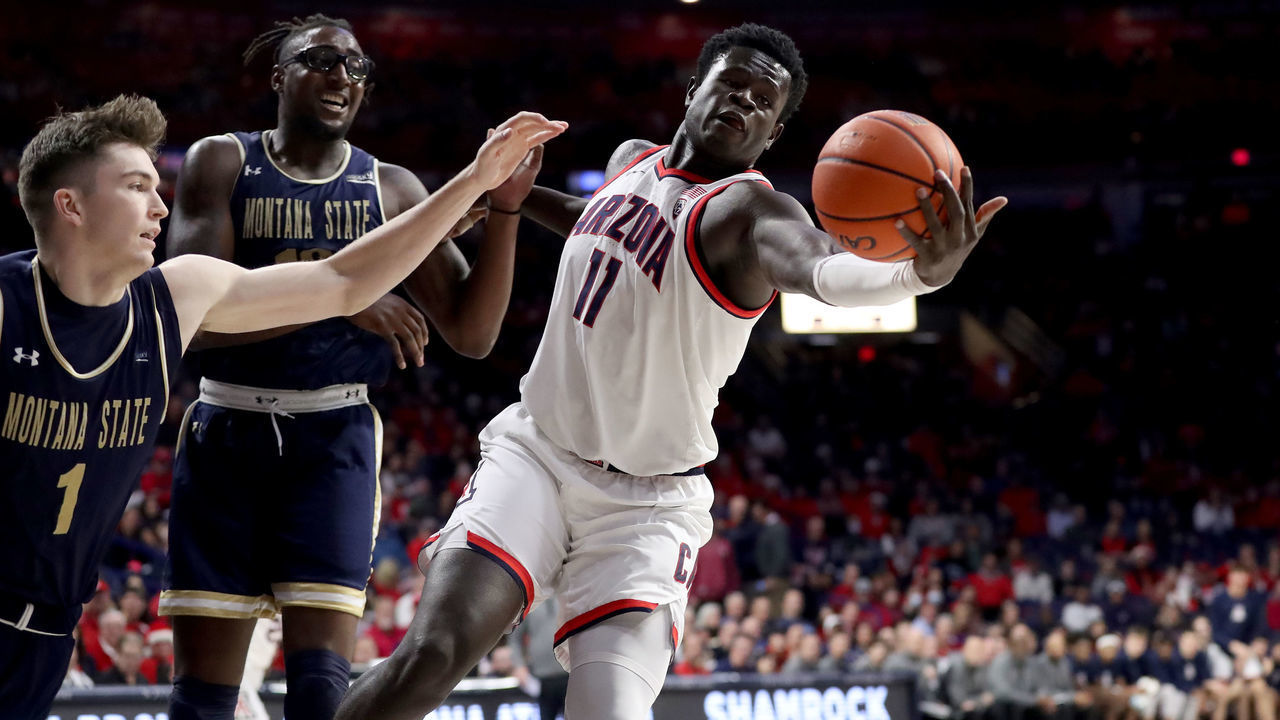 TUCSON, AZ - DECEMBER 20: Arizona Wildcats center Oumar Ballo #11 reaches for a rebound during the first half of a basketball game between the Montana State Bobcats and the Arizona Wildcats on December 20, 2022 at McKale Center in Tucson, Arizona.